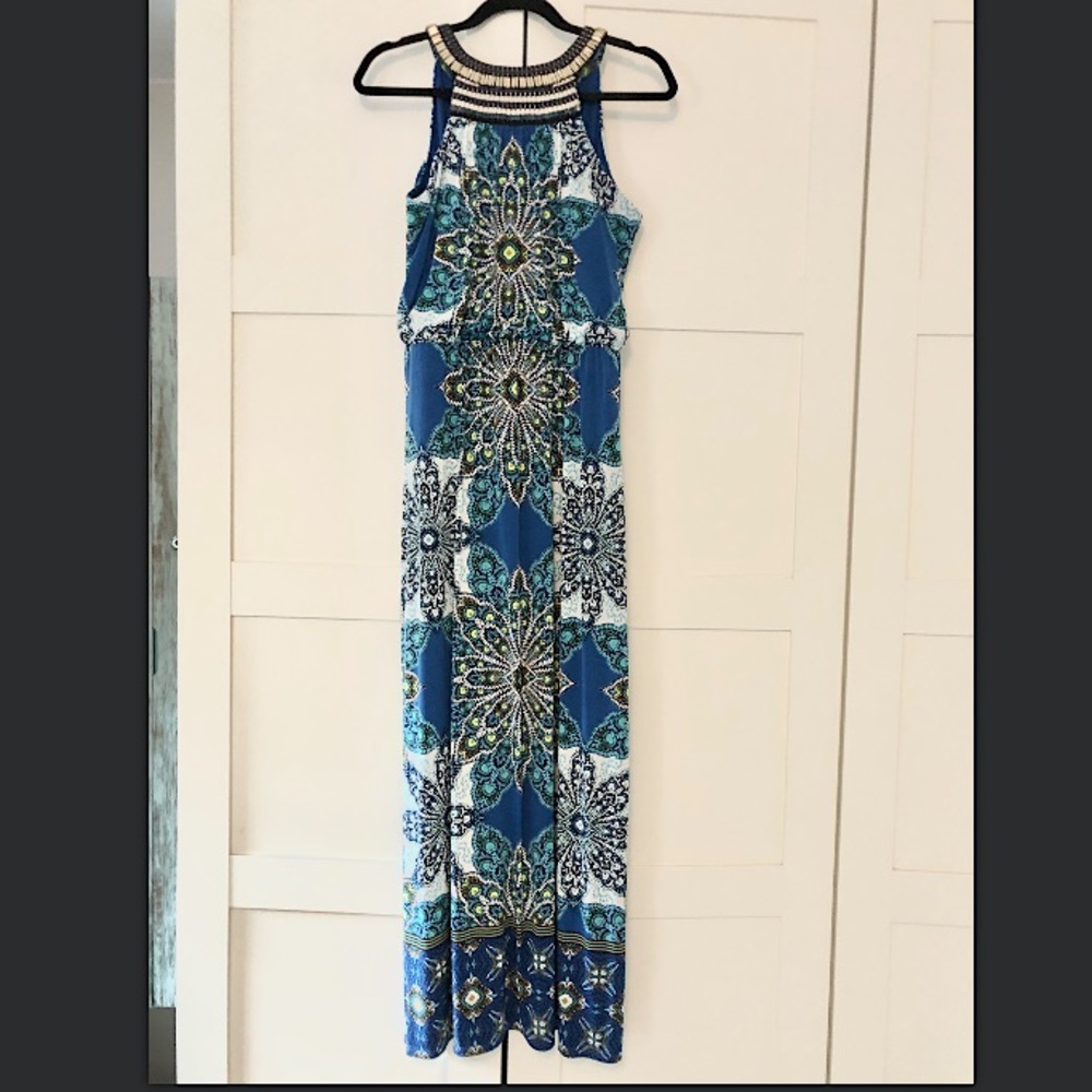 Bohemian peacock inspired maxi dress with intricate beading around collar